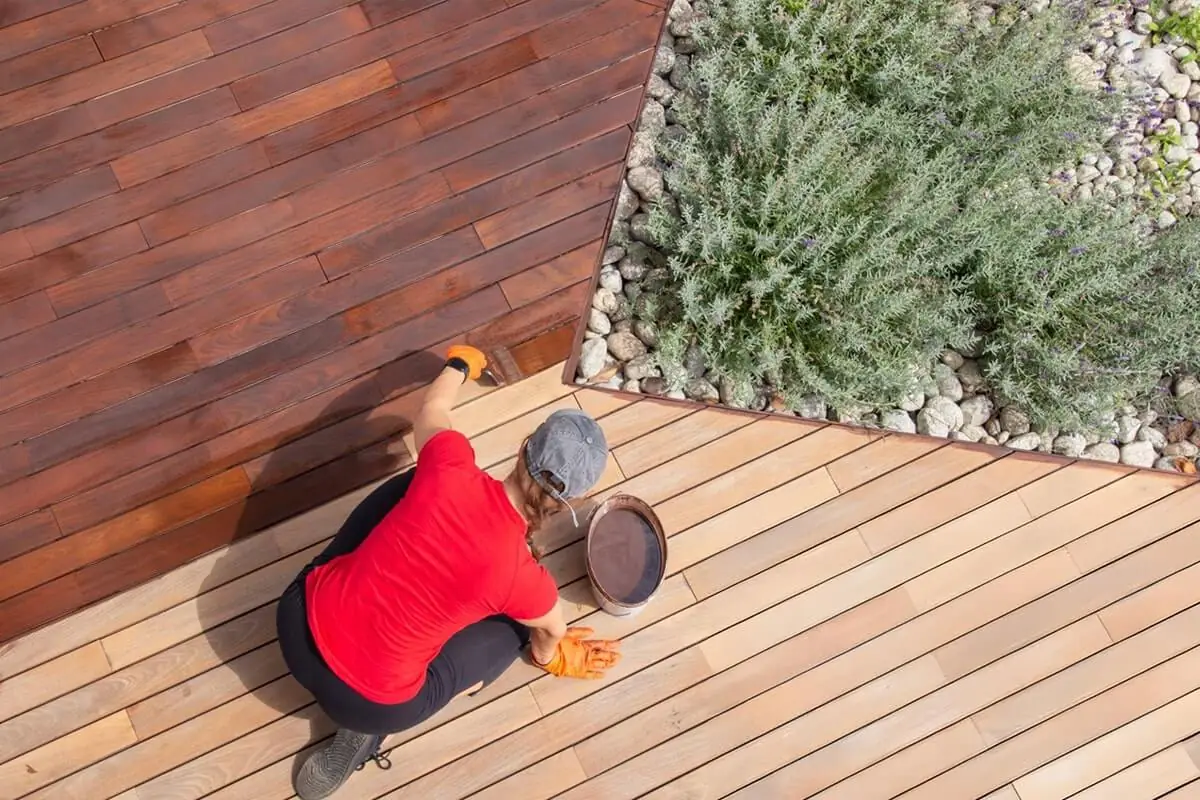 Illustration of deck staining (stock photo)